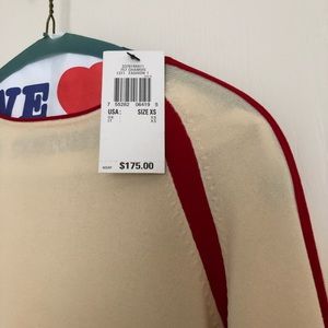 Cream and red sweater